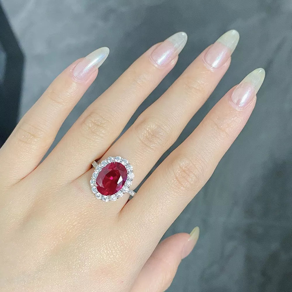 925 Sterling Silver Ring With Oval Diamond Accents in ruby red with oval cut