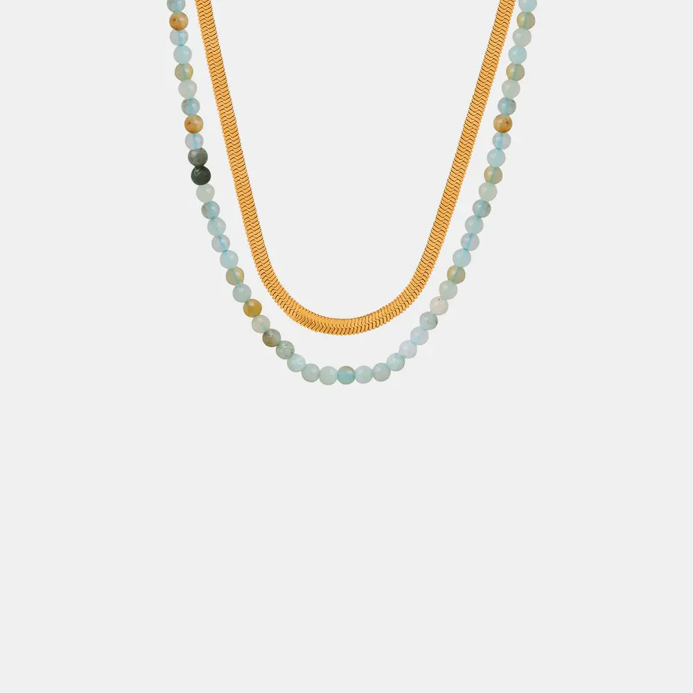 Gold serpentine chain and light blue beaded layered necklace set