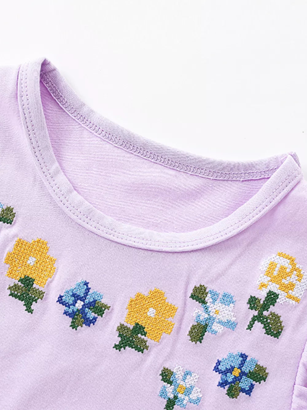 Toddler lavender cotton dress with embroidered floral pattern and crew neck.