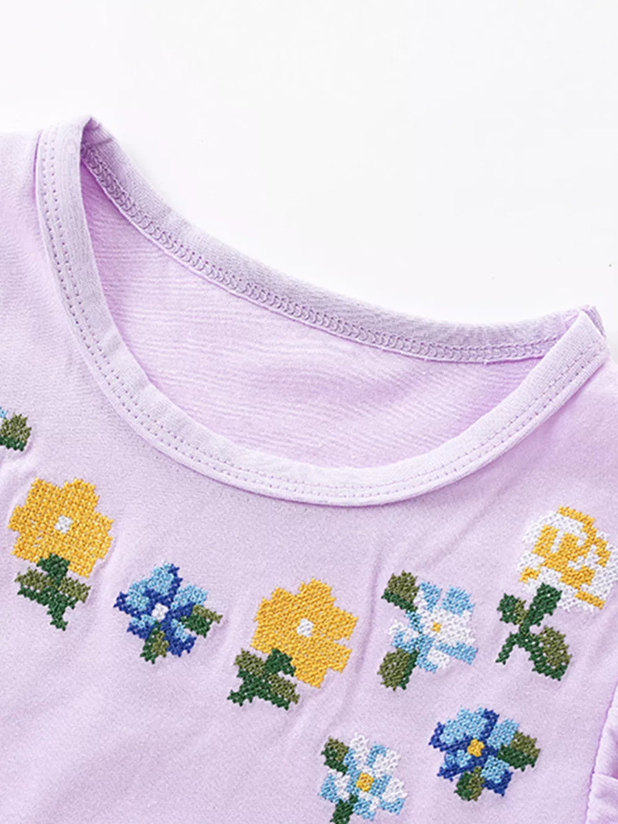 Toddler lavender cotton dress with embroidered floral pattern and crew neck.