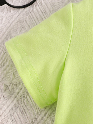 Children's lime green short sleeve polo shirt detail