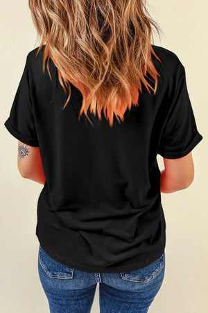Black t-shirt with cuffed short sleeves and a relaxed fit.