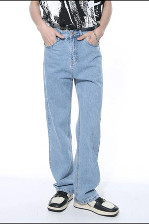 Relaxed fit light wash denim jeans with a straight leg cut.