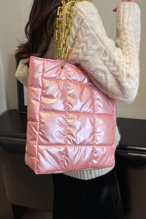 Pink quilted nylon tote bag with gold chain handle