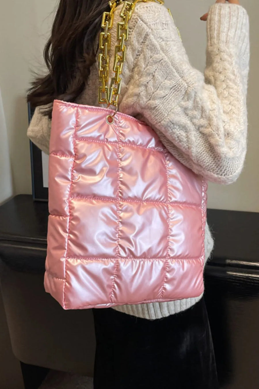 Pink quilted nylon tote bag with gold chain handle