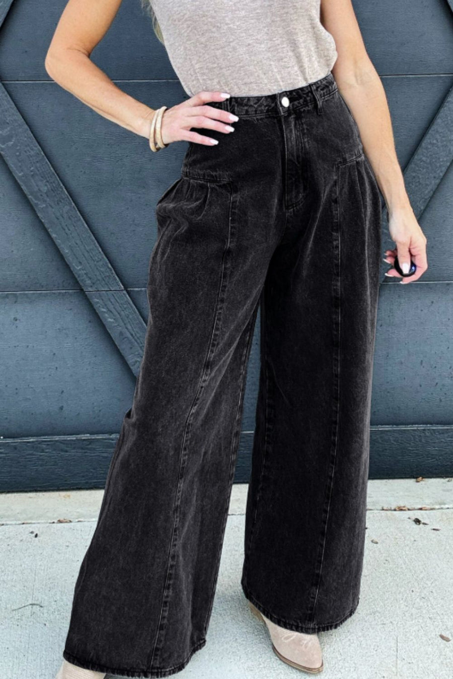 Black pleated front palazzo jeans with a wide leg