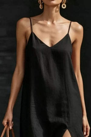 Black V-neck maxi dress with spaghetti straps and a side slit.