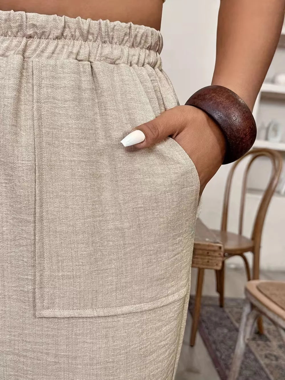 100% polyester Care instructions: Machine wash cold wide-leg pants in Khaki with loose silhouette
