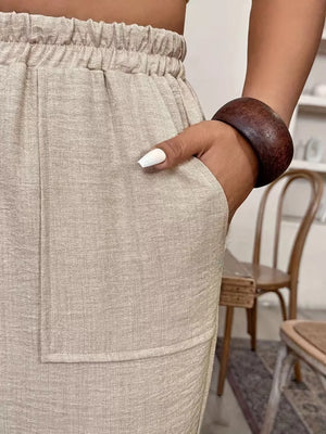 100% polyester Care instructions: Machine wash cold wide-leg pants in Khaki with loose silhouette