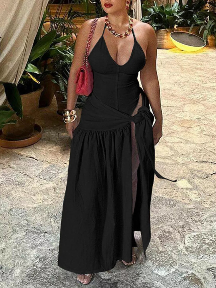 Black halter neck ruched maxi dress with deep v-neck and high slit