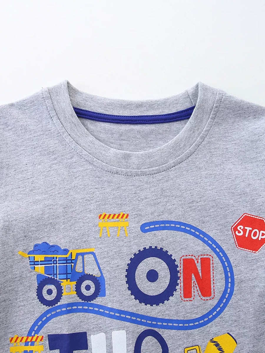 Grey cotton toddler t-shirt with construction truck and "ON" graphic.