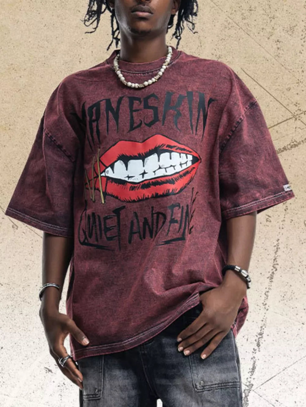 Edgy lip graphic men's burgundy crew neck t-shirt with distressed wash and text.