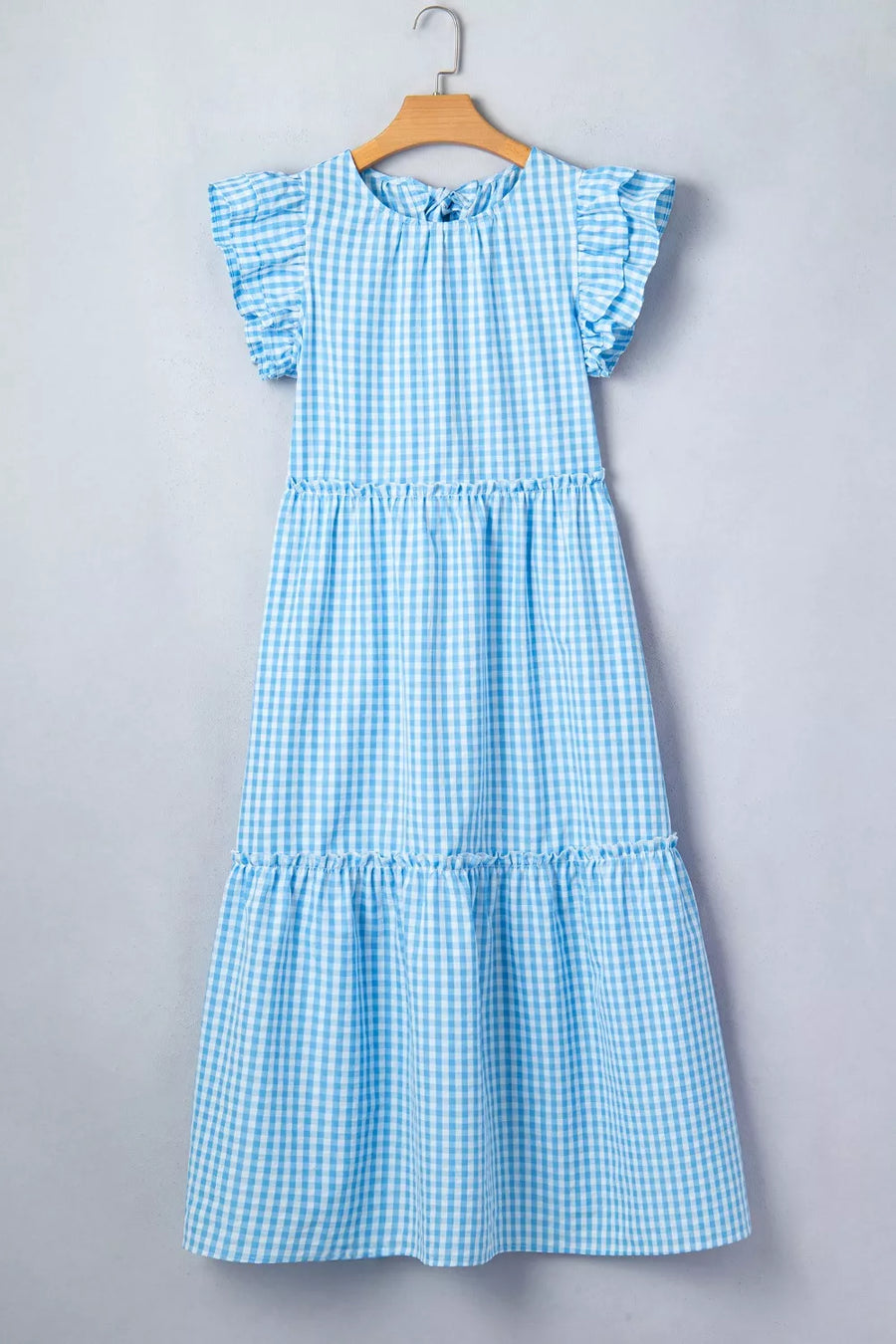 Blue gingham tiered maxi dress with ruffled sleeves and knot back detail