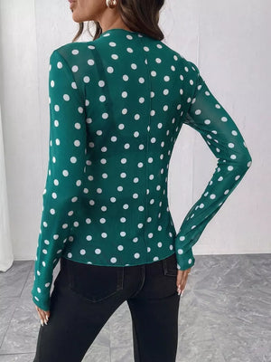 white fitted blouse with mock neck
