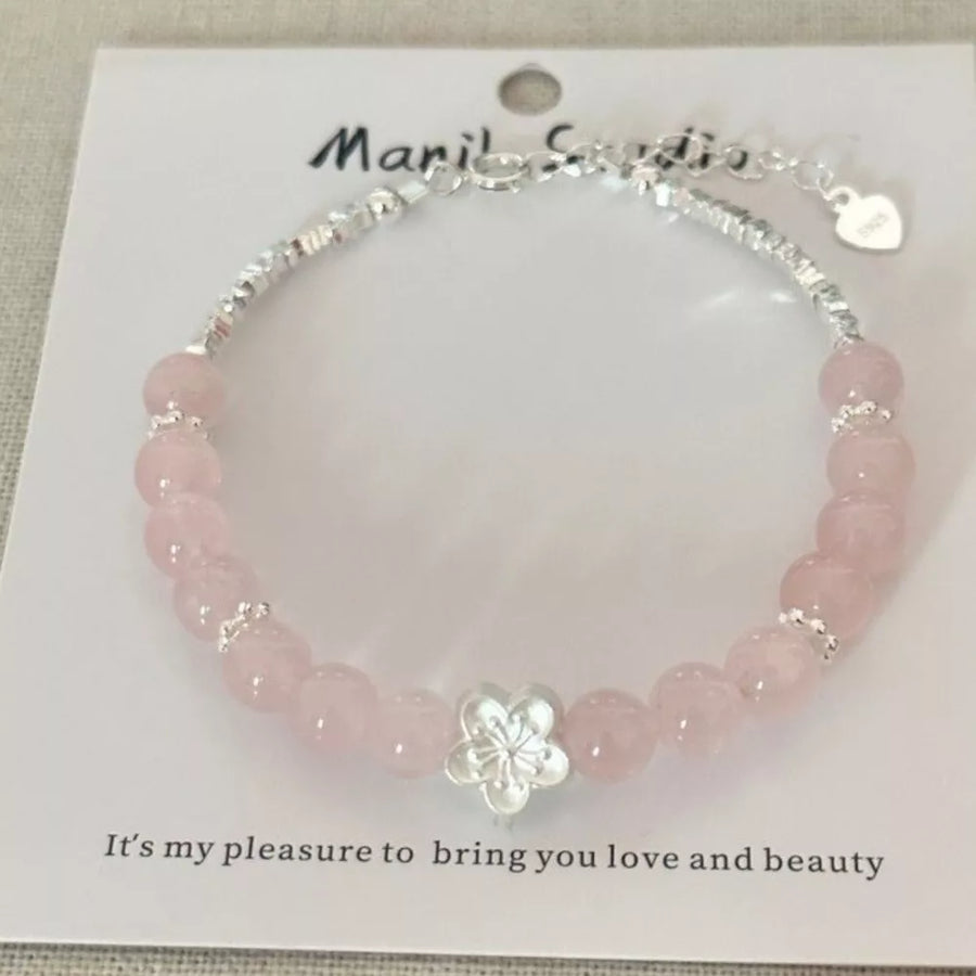 bracelet featuring floral in blush pink with 925 sterling silver,Crystal Care instructions: Avoid wearing during exercise