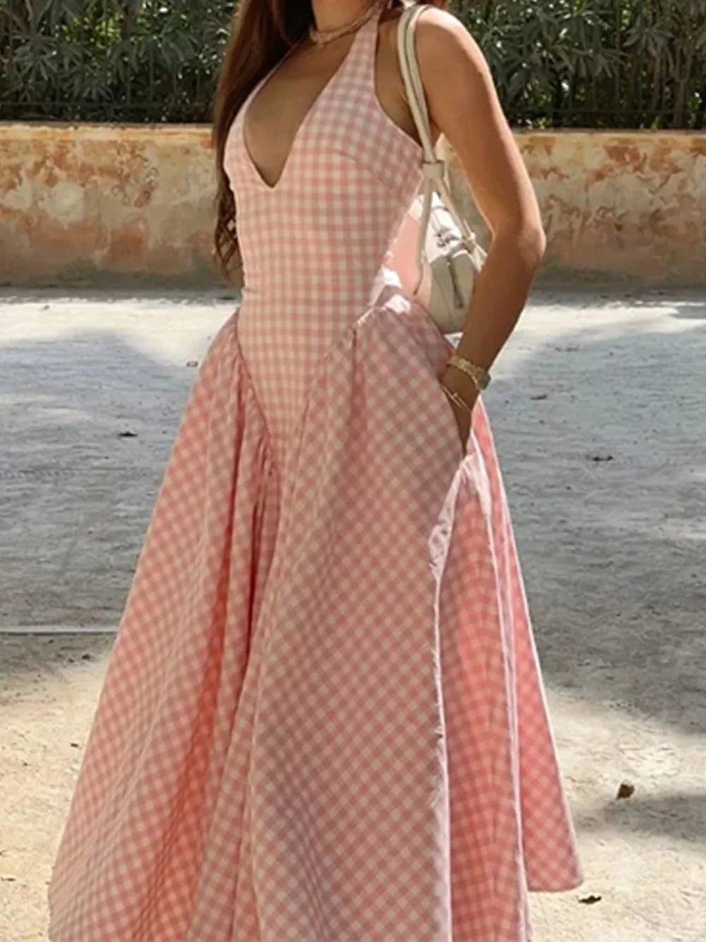 white maxi dress featuring halter neck and gingham