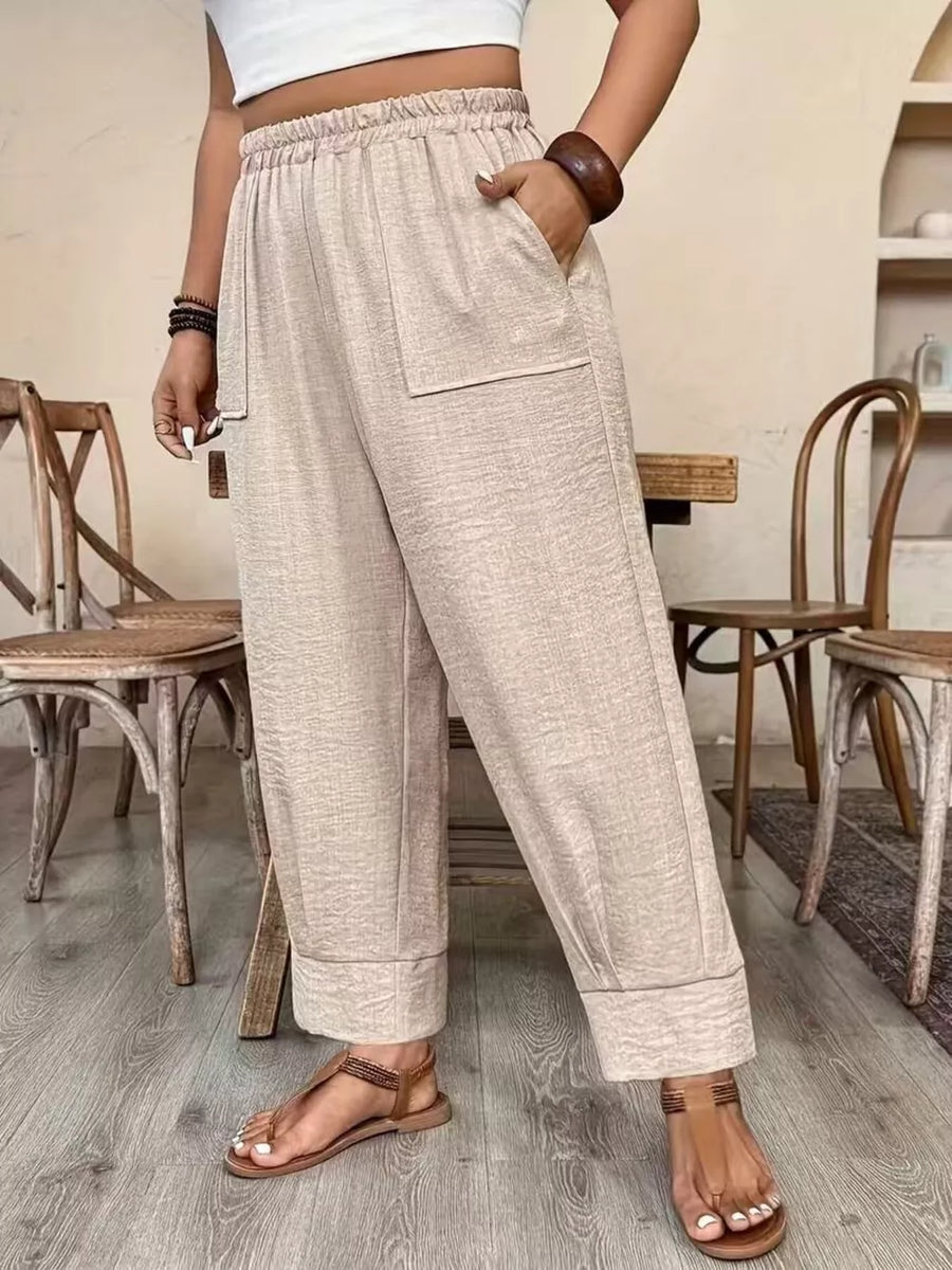 100% polyester Care instructions: Machine wash cold wide-leg pants in Black with loose silhouette