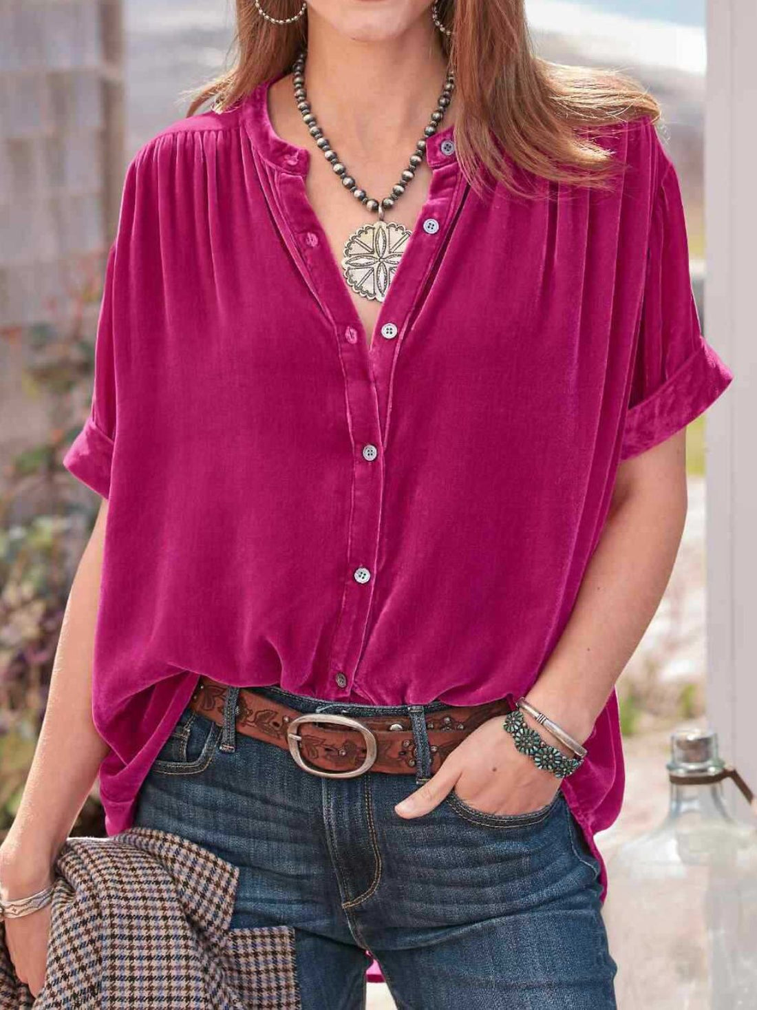 Velvet button-down top in cerise with mandarin collar and short sleeves.