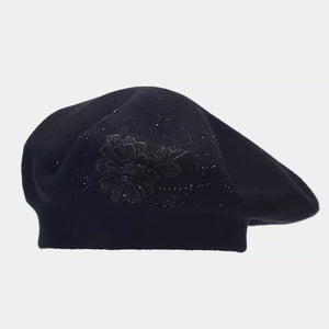 hat in black featuring rhinestone embellishment and fitted fit