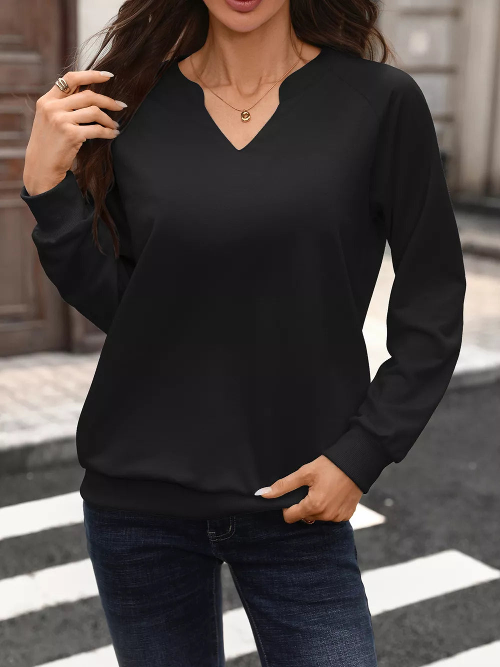 65% Rayon 30% Polyester 5% Spandex Care instructions: Machine wash cold sweatshirt in Black with relaxed silhouette