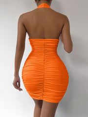 Orange halter neck ruched mini dress with backless detail