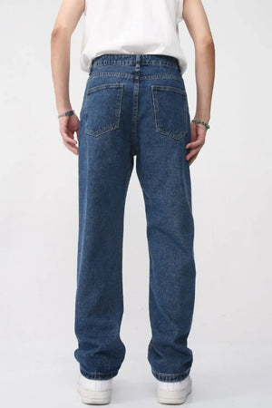 Faded wash baggy jeans in dark denim with a relaxed fit.