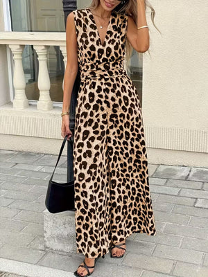 Chic sleeveless leopard print romper with V-neck and cinched waist.