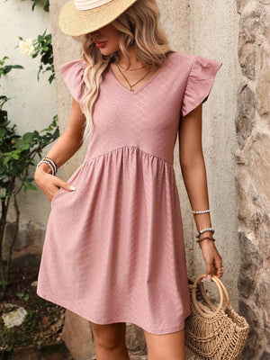 A-line dress in bean paste powder with ruffled sleeves and a textured pattern.