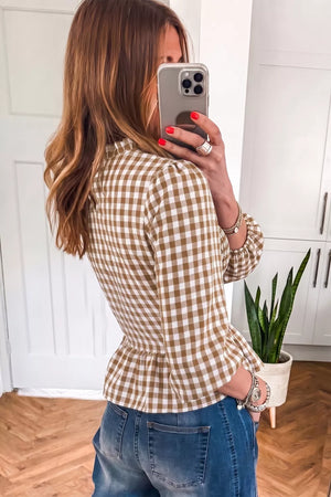 white blouse featuring smocked and gingham