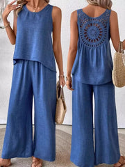 Dark blue two-piece set with round neck sleeveless top and wide-leg pants, featuring crochet back detail.