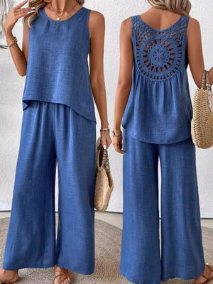 Dark blue two-piece set with round neck sleeveless top and wide-leg pants, featuring crochet back detail.