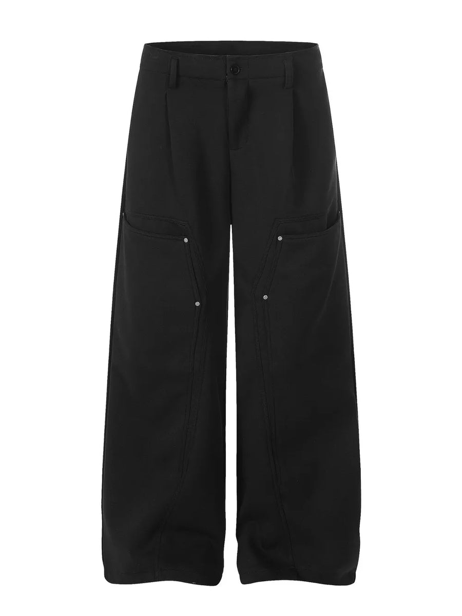 Black wide-leg sweatpants with utility pockets and silver stud details.