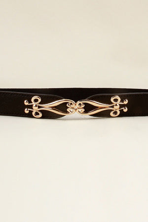 Black elastic belt with a sculpted gold alloy clasp closure.