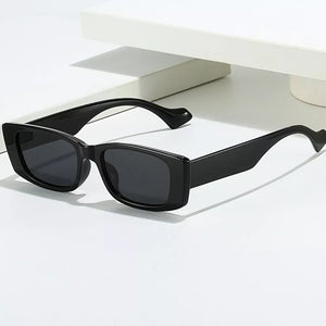 PC Frame material: Polycarbonate Lens material: Polycarbonate Temple material: P sunglasses in Black with straight silhouette