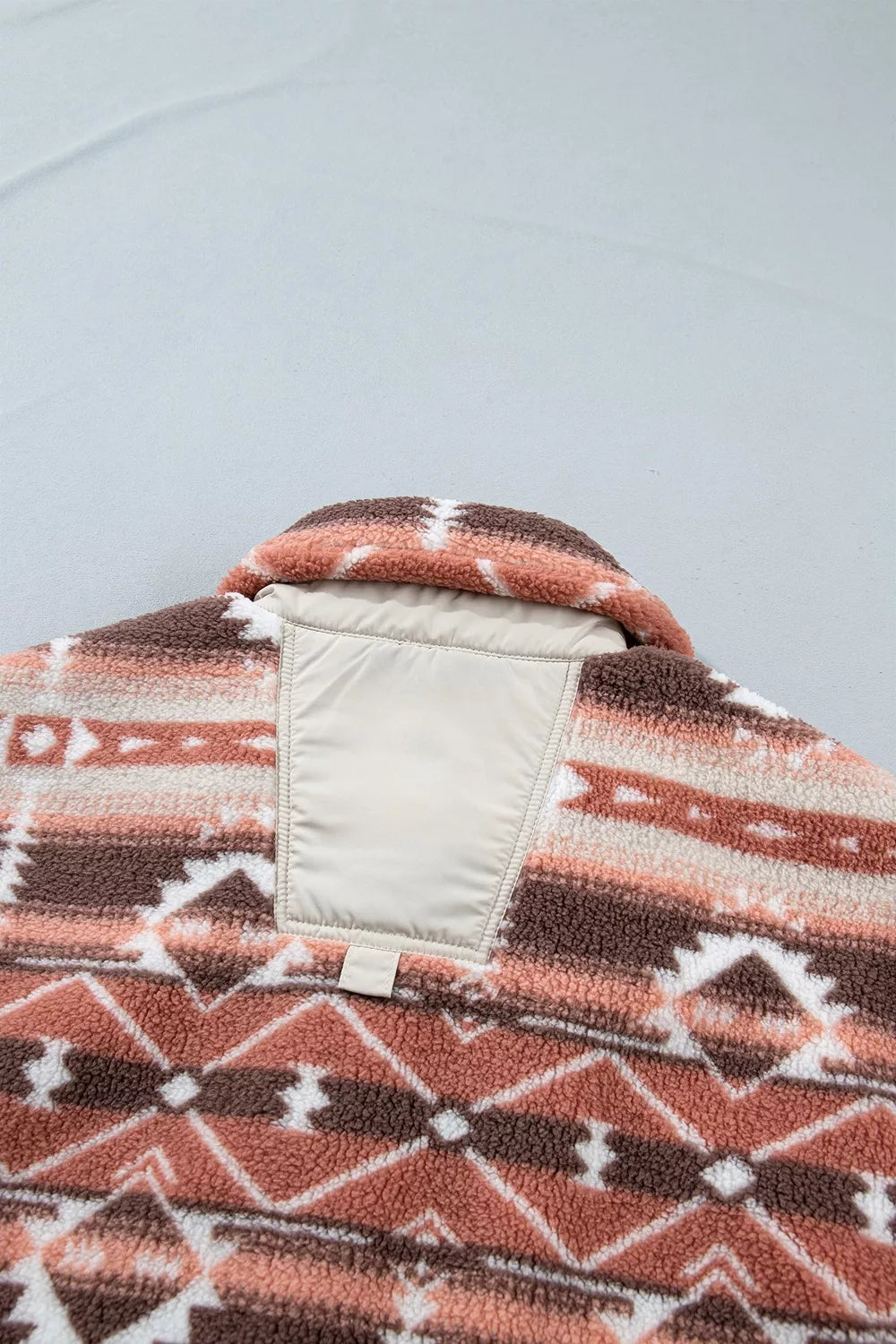 Geometric Print Fleece Button Placket Vest in Dusty Pink with hooded