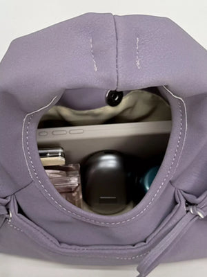 crossbody bag in Pink Purple with bow details and small