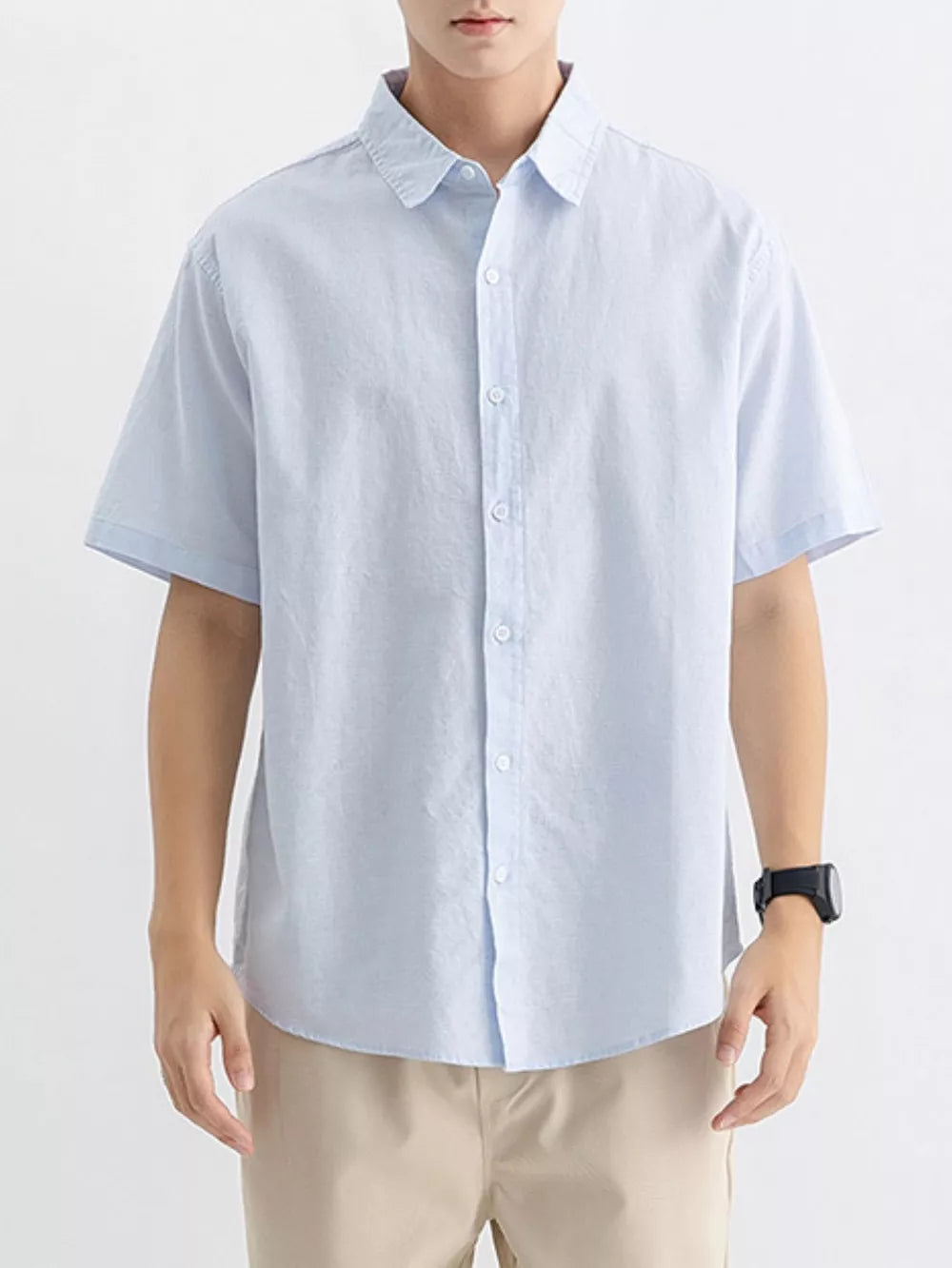 Light blue cotton short sleeve button-up shirt with a classic collar.