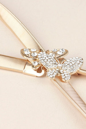 Gold elastic belt with a crystal-embellished butterfly clasp
