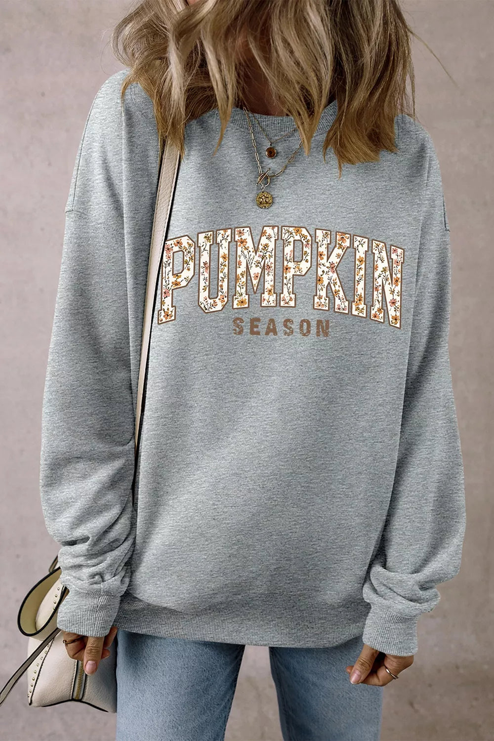 50% polyester, 50% cotton Care instructions: Machine wash cold sweatshirt in rust with oversized silhouette