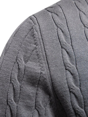 Gray cable knit crewneck sweater with textured knit details.