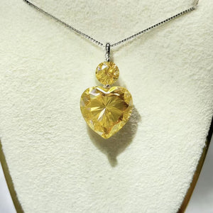 necklace in yellow featuring heart-shaped pendant and straight fit