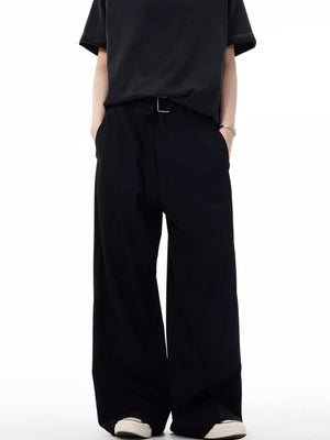 Men's black wide-leg casual sweatpants with a D-ring belt and pockets.