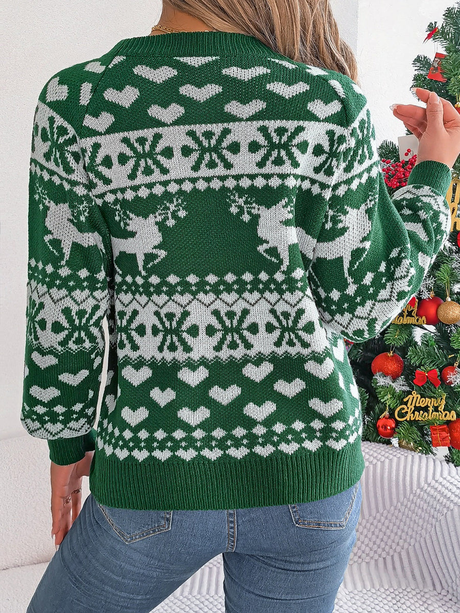 Green acrylic sweater with white reindeer, snowflake, and heart jacquard pattern.