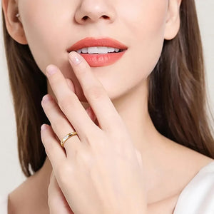 Gold baguette cut moissanite band ring with a single stone detail.