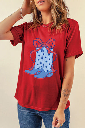 Red graphic tee with cowboy boot bow print