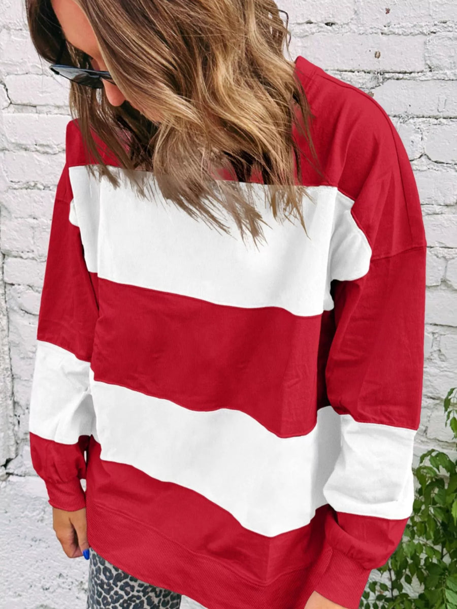 Drop shoulder baggy sweatshirt in scarlet and white stripes with a crew neck and long sleeves.