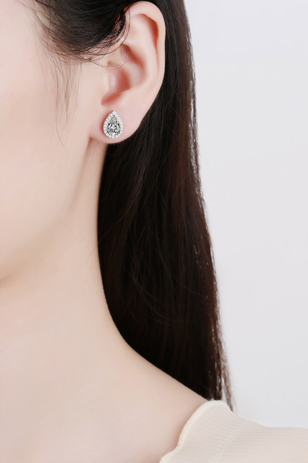 Silver teardrop halo earrings with pavé detail