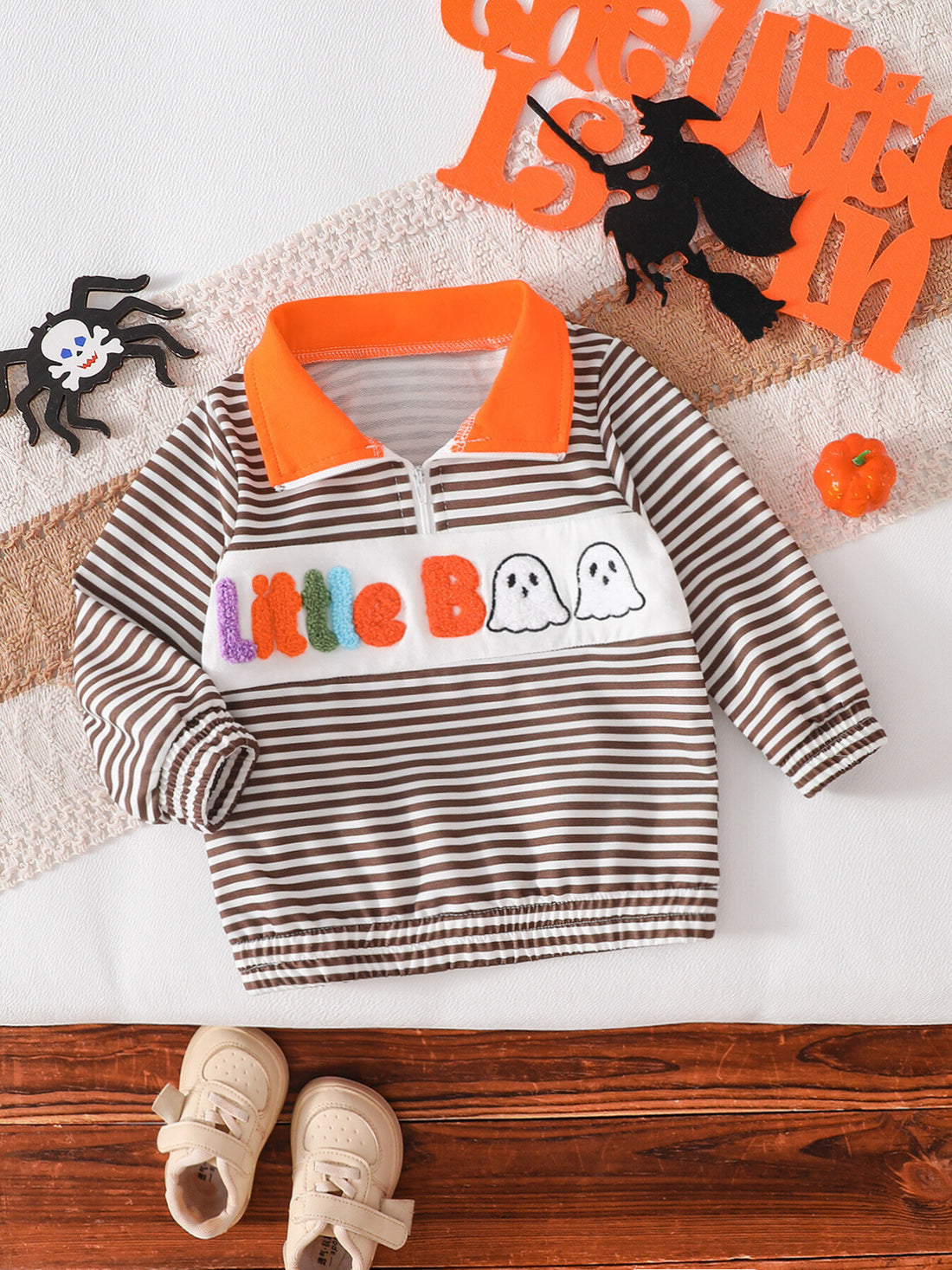 brown sweatshirt with striped and collared