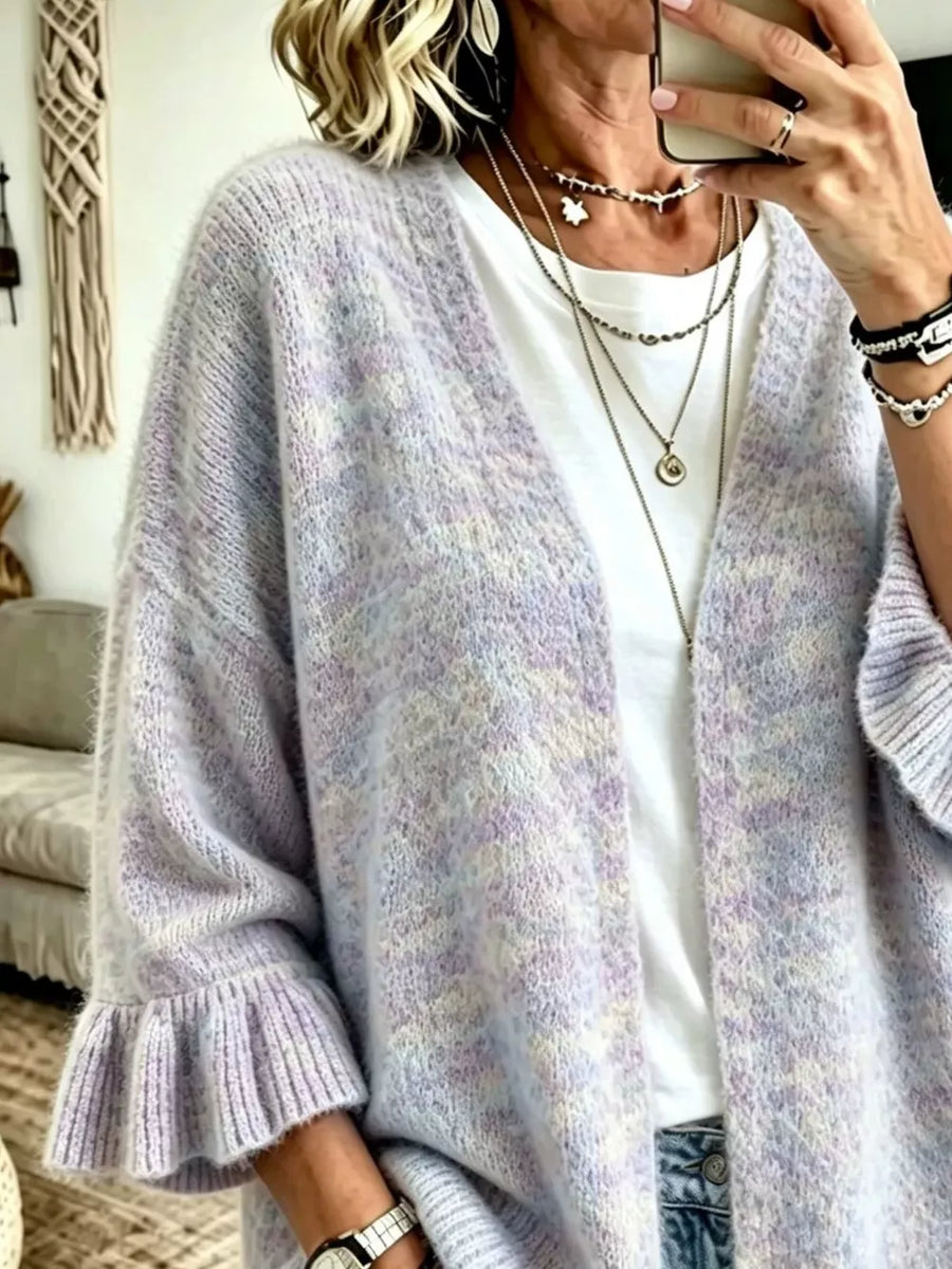 light blue cardigan featuring ruffle sleeve and marled