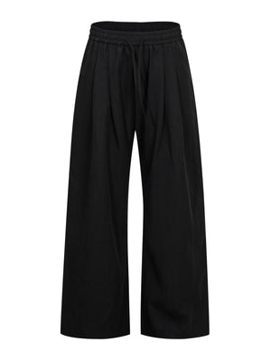 wide-leg pants in Cream with drawstring waist and full-length